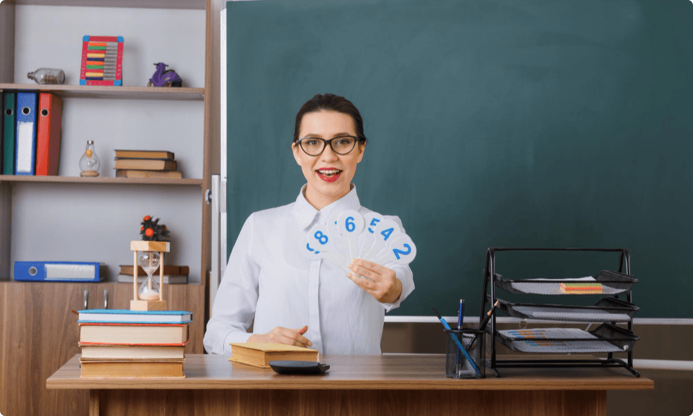 young woman teacher wearing glasses explaining lesson  with confidence