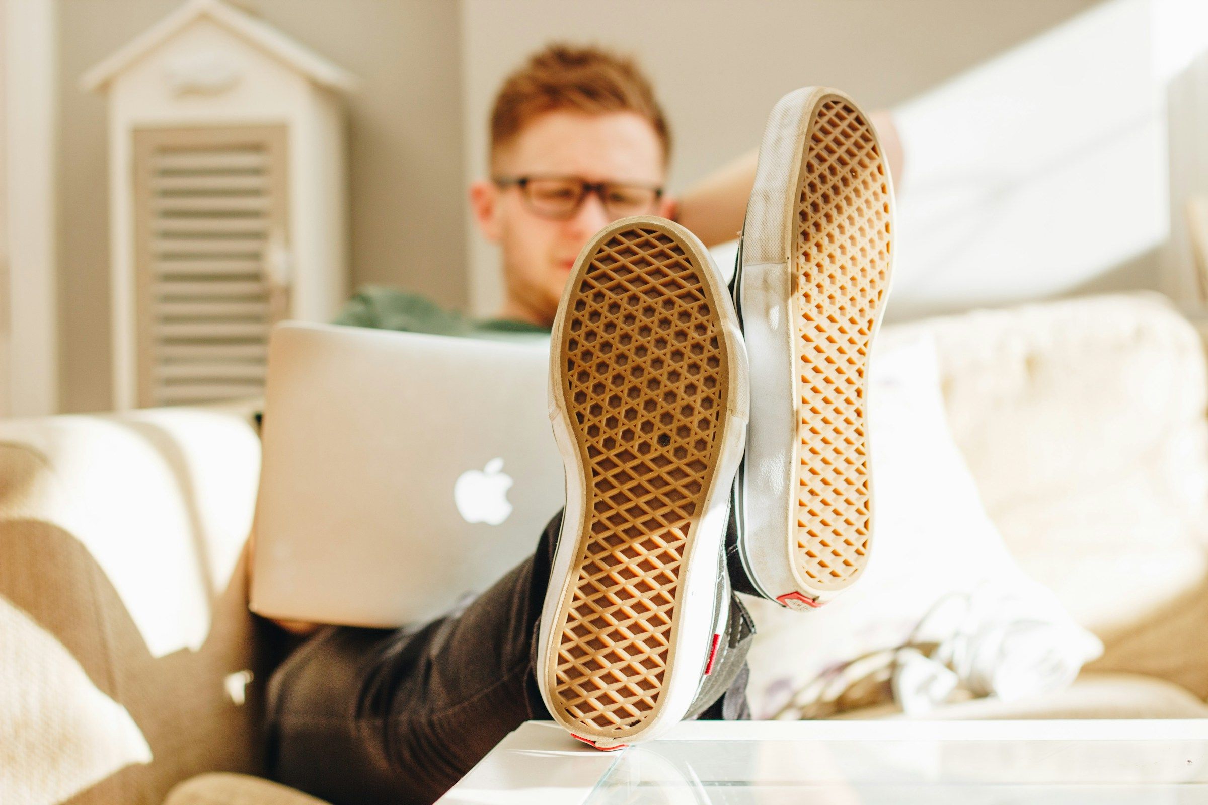 man working on laptop - Team Holiday Gifts