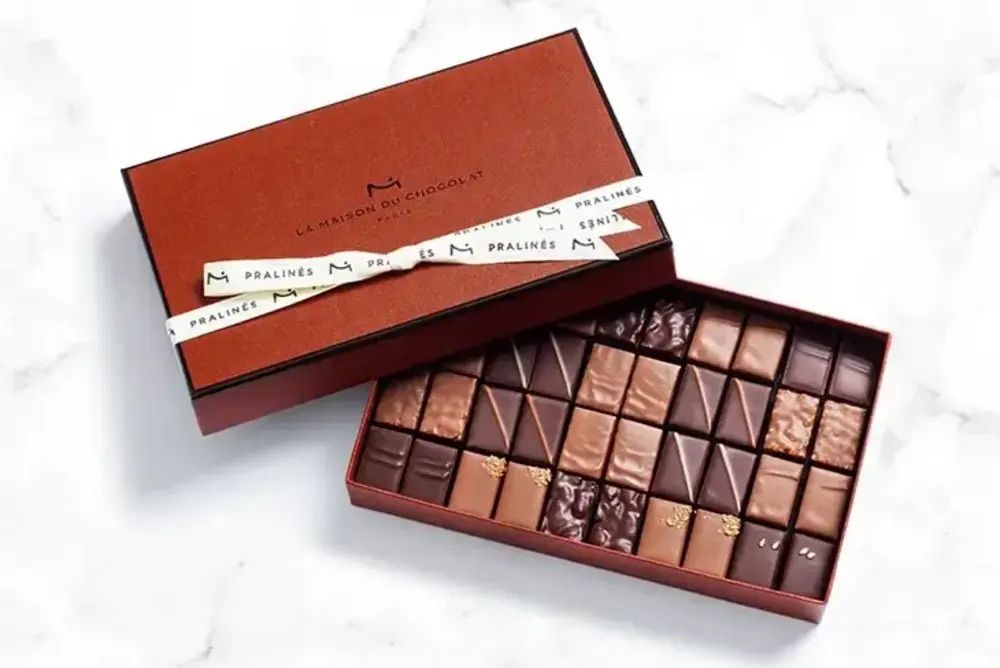 A box of gourmet chocolates from La Maison Du Chocolat.