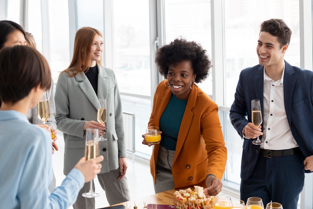 Close-up of smiling individuals at a work event - employee recognition companies