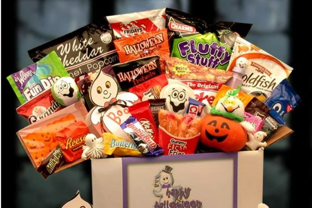 Halloween boo box care package with candies and snacks