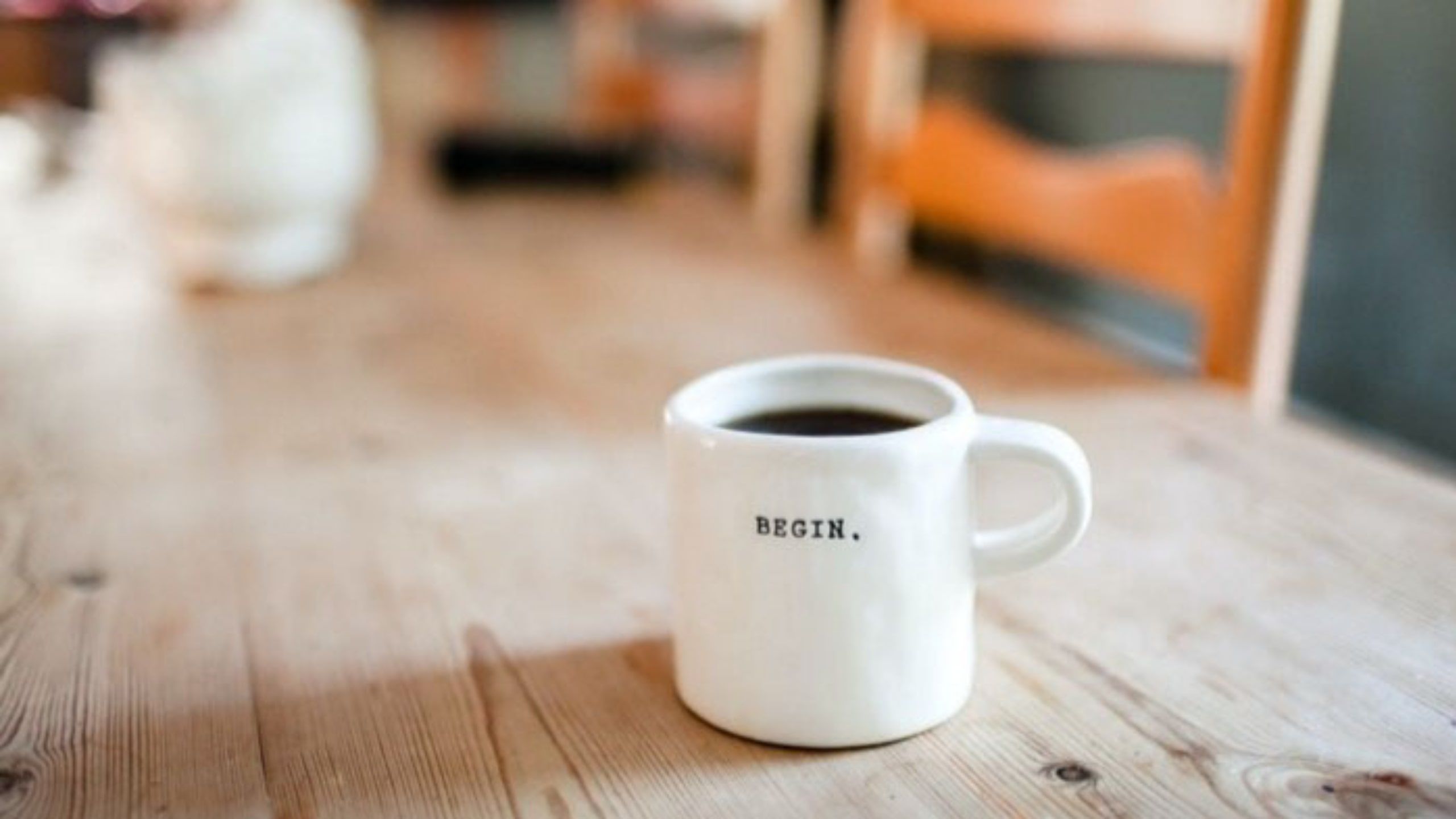 coffee mug with the word begin on it