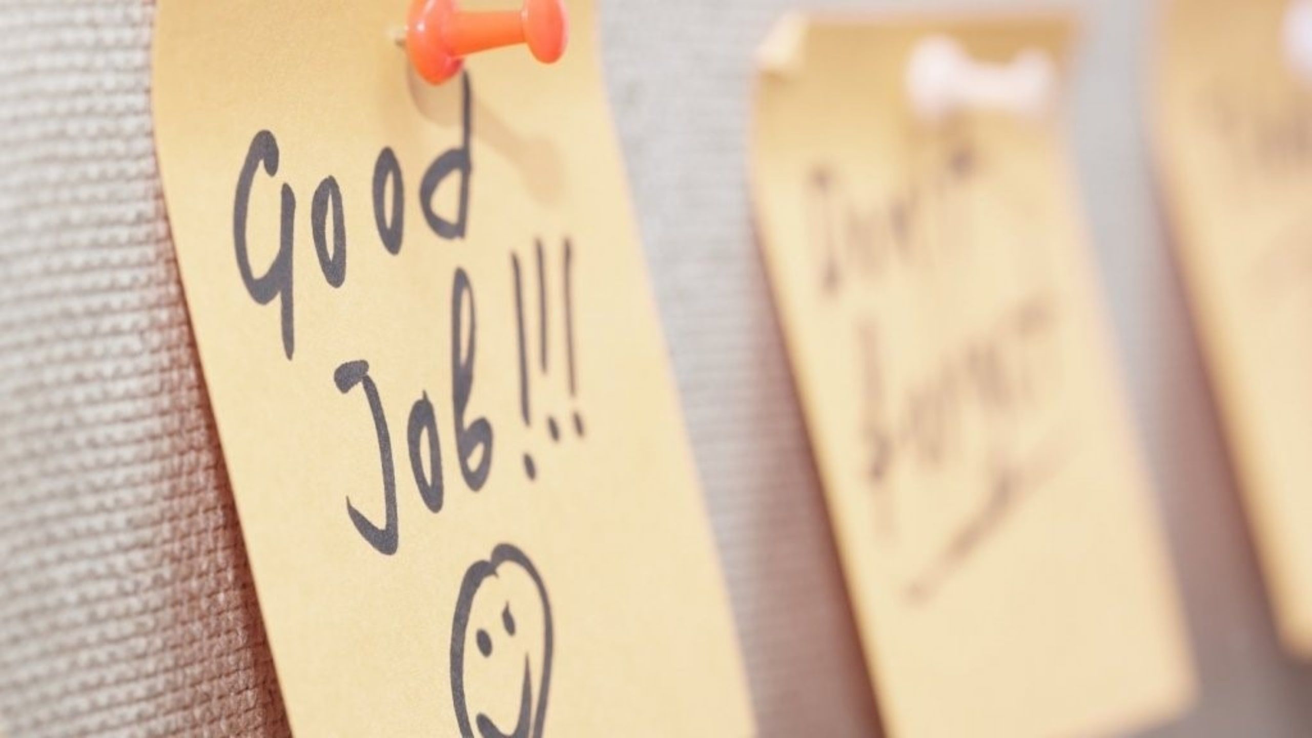 a note says good job to motivate employees, setup for Employee Recognition Program 