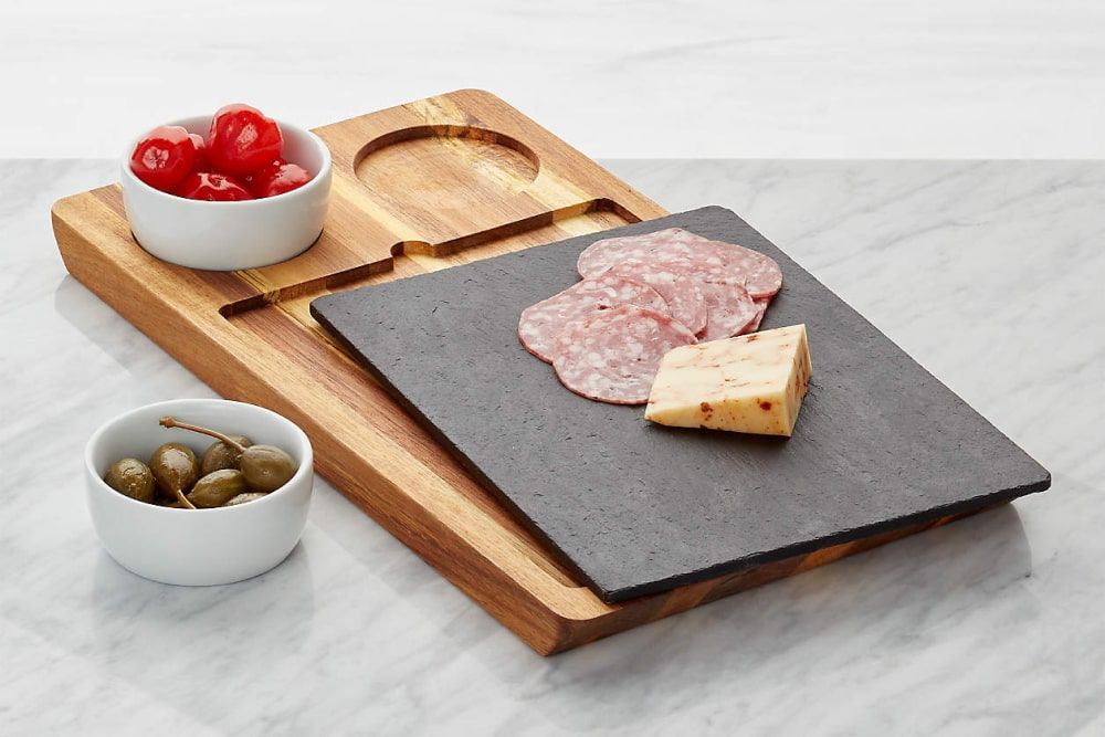 The slate and wood serving board with bowls for grand opening gifts ideas