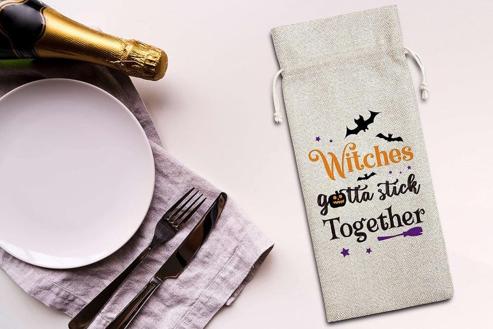 Witch-themed gift bag with a wine and other utensils