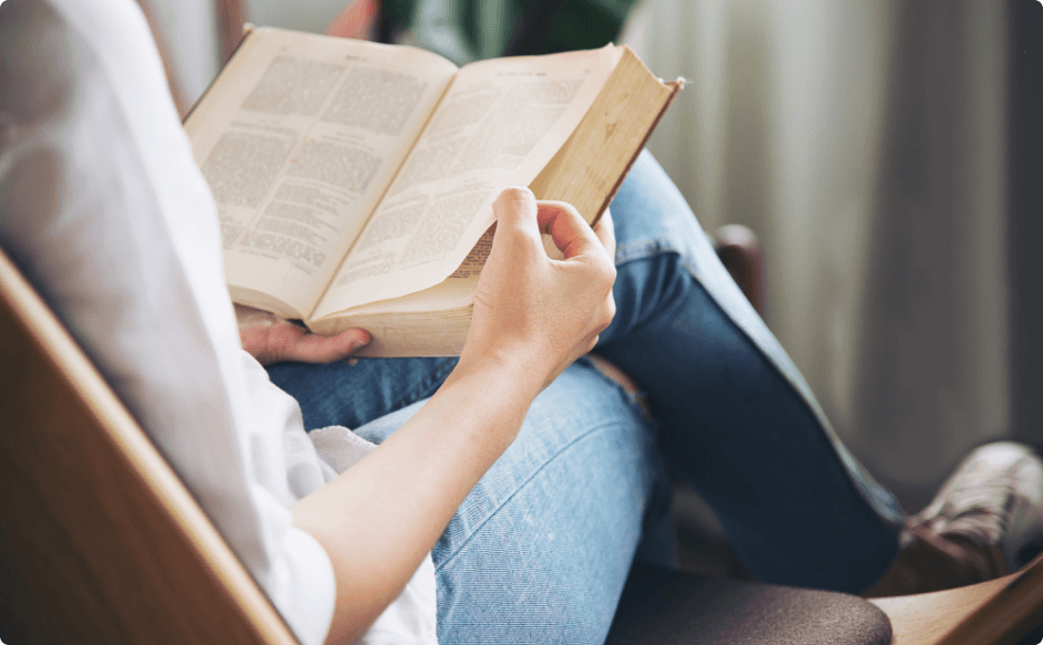 asian young lady reading a book