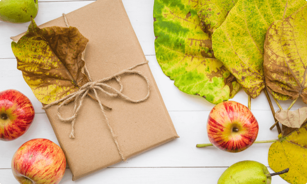 best employee appreciation gifts under $15 in a brown gift box with fall leaves on it