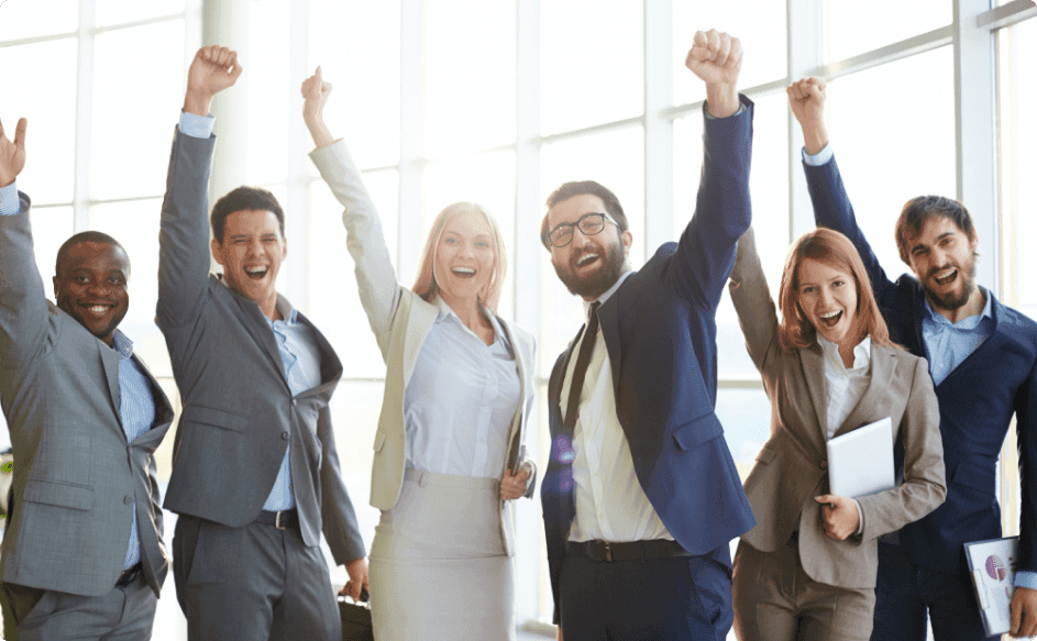 business people celebrating success after sharing no-cost employee appreciation ideas with each other