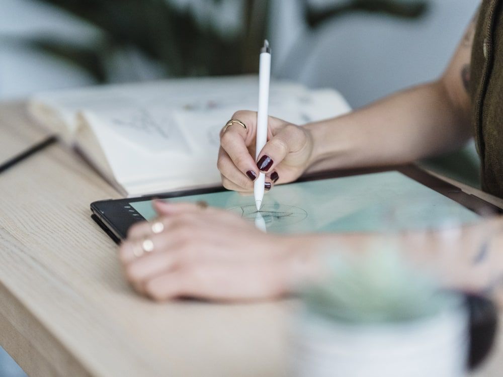 female creative designers using a graphic tablet