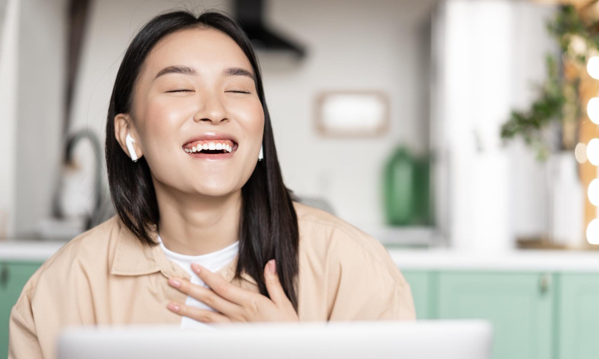 happy asian girl satisfied with the benefits of employee recognition
