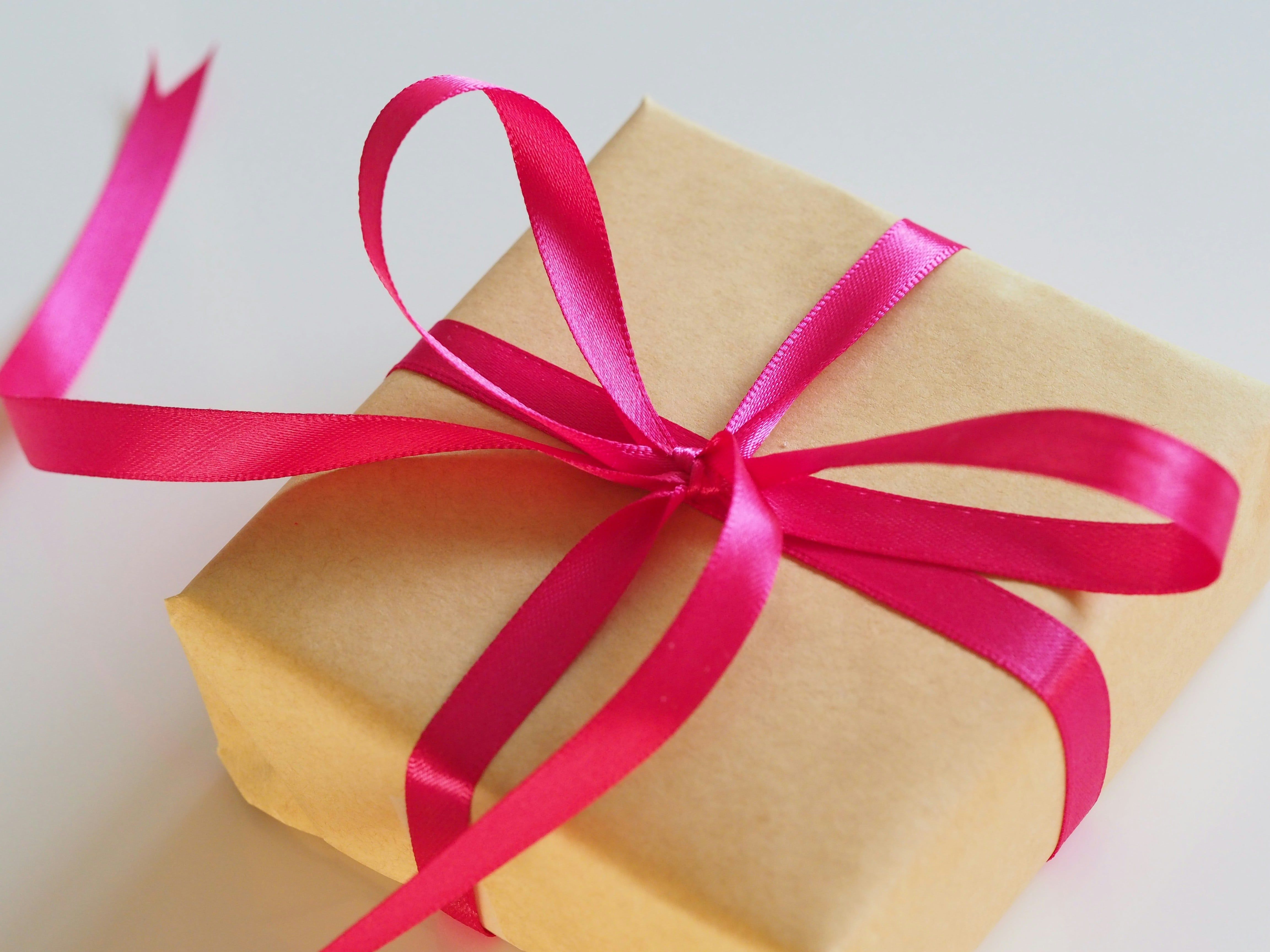 gift wrapped with a pink ribbon - corporate gifting business