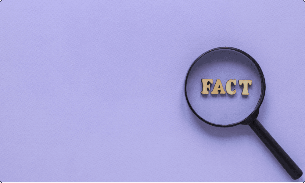 magnifying glass over the word fact