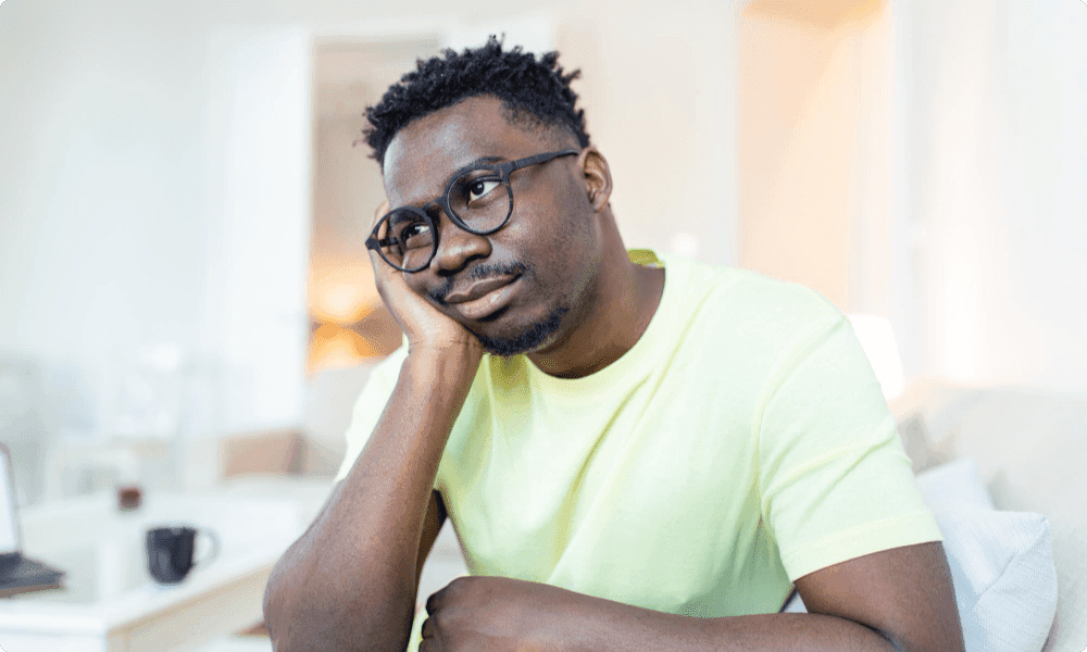 person thinking about quitting and just sitting at his desk