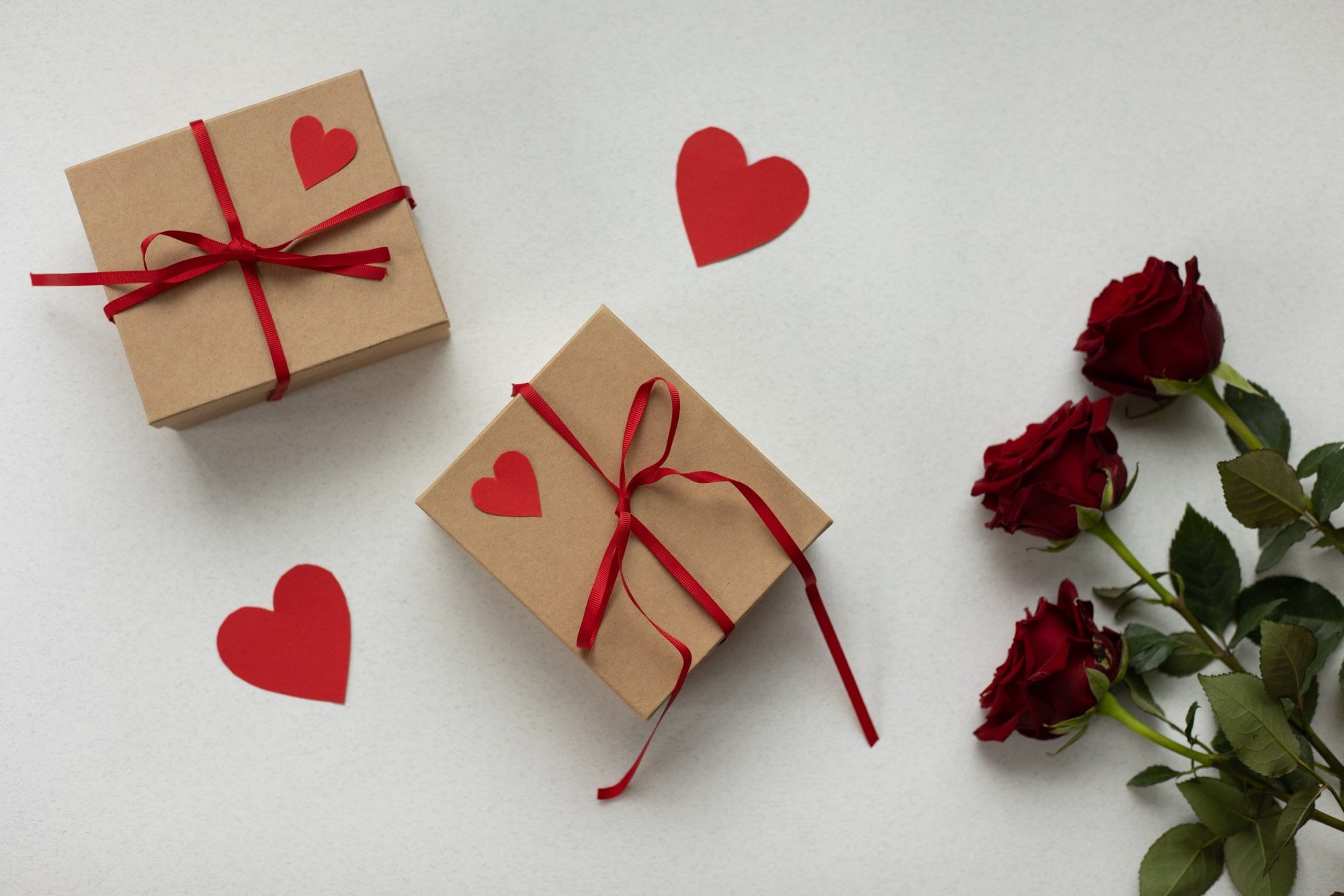 two valentine gift box wrapped with heart sharped origami