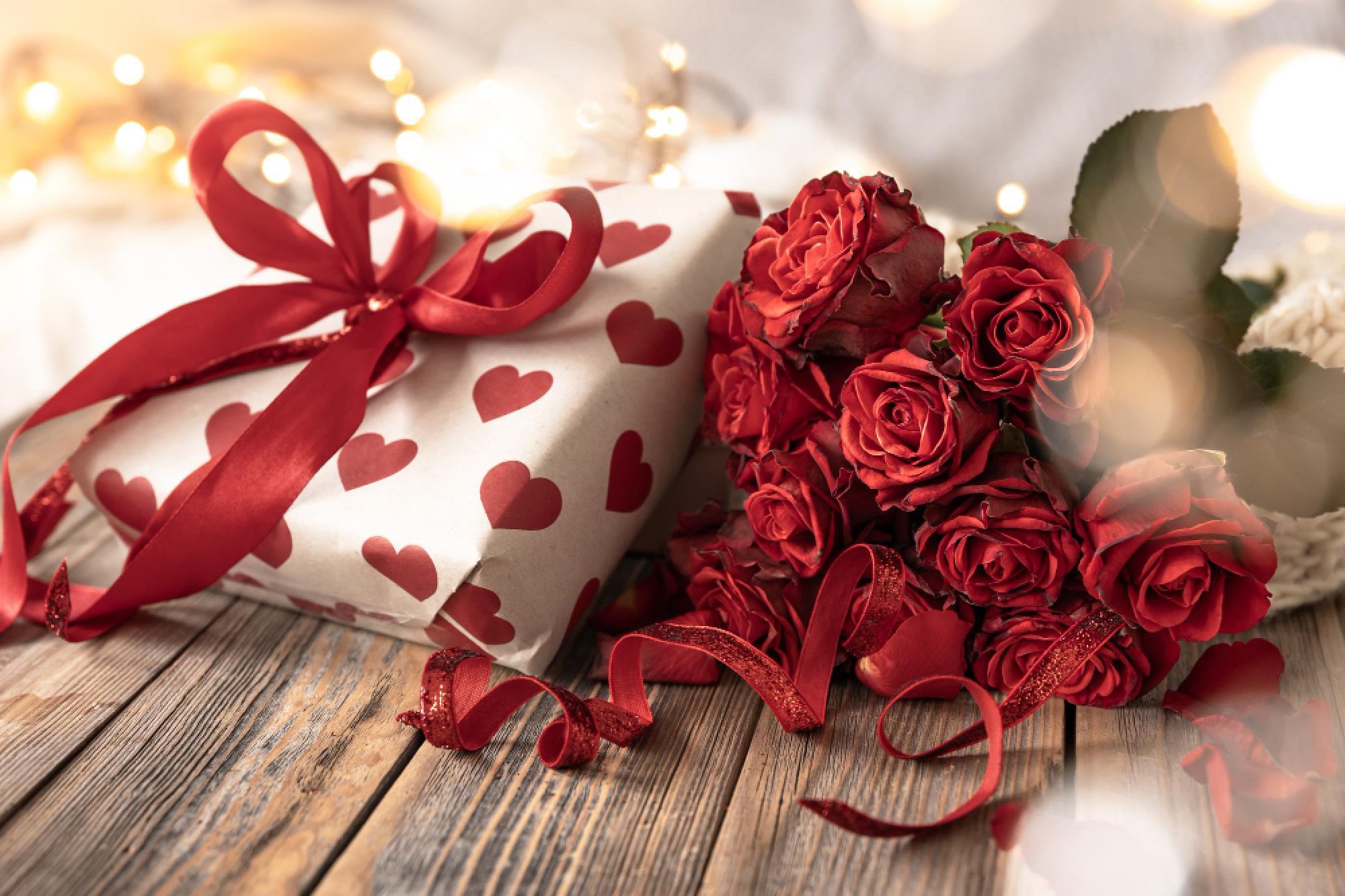 valentine gift beautifully wrapped with roses on the side
