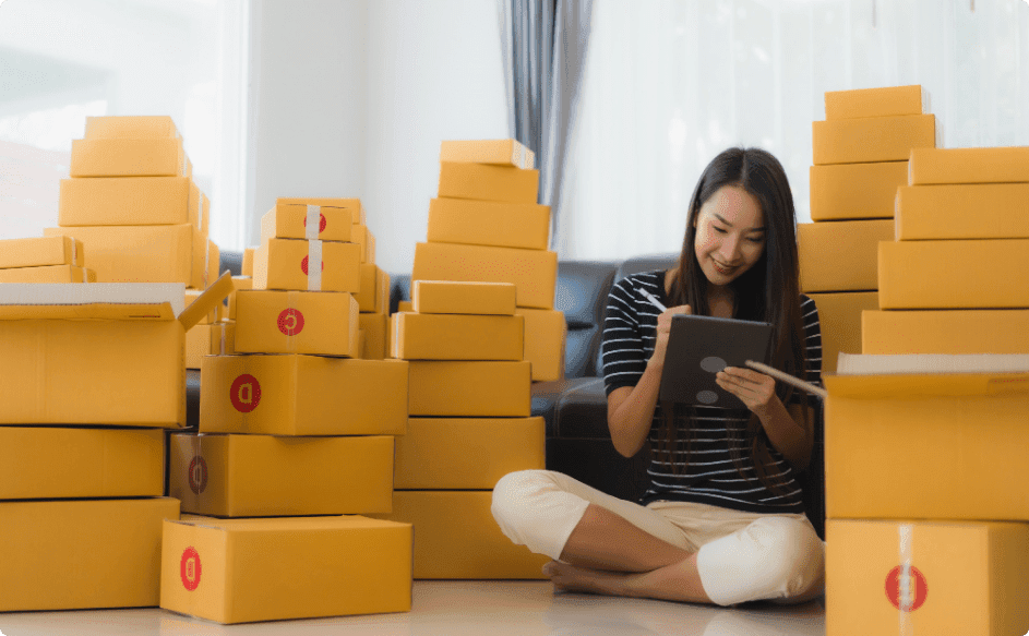 woman with cardboard parcel boxes